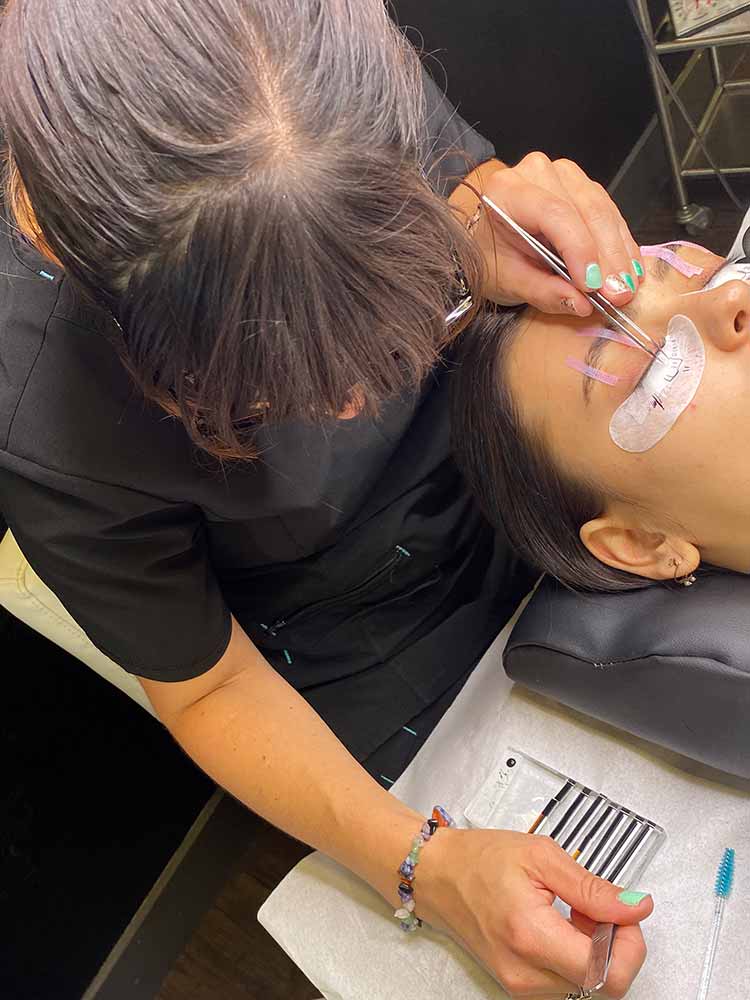 Applying lashes during a course